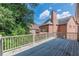 Deck with railing offering backyard and home views at 1829 Buckhead Valley Ne Ln, Atlanta, GA 30324
