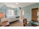 Serene bedroom with a double bed, built-in desk, and large windows at 1829 Buckhead Valley Ne Ln, Atlanta, GA 30324
