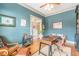 Spacious home office features built-in shelving and hardwood floors at 1829 Buckhead Valley Ne Ln, Atlanta, GA 30324