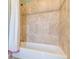 Simple bathroom with shower/tub and updated tile at 1829 Buckhead Valley Ne Ln, Atlanta, GA 30324