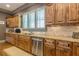 Modern kitchen with stainless steel appliances and wood cabinets at 1829 Buckhead Valley Ne Ln, Atlanta, GA 30324