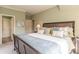 Well-lit bedroom with a king-size bed and access to the bathroom at 1829 Buckhead Valley Ne Ln, Atlanta, GA 30324