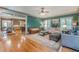 Open living room showcasing hardwood floors, a view into the dining room and kitchen at 1829 Buckhead Valley Ne Ln, Atlanta, GA 30324