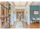 Elegant entryway with hardwood floors, chandelier, and French doors at 1829 Buckhead Valley Ne Ln, Atlanta, GA 30324