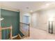 Upstairs hallway with two doors and neutral color scheme at 1829 Buckhead Valley Ne Ln, Atlanta, GA 30324