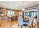 Open kitchen with island, hardwood floors, and view into Gathering room at 1829 Buckhead Valley Ne Ln, Atlanta, GA 30324