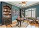 Spacious home office with built-in bookshelves, hardwood floors, and large window at 1829 Buckhead Valley Ne Ln, Atlanta, GA 30324