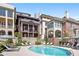 Circular pool with plenty of lounge chairs for residents at 98 Ottley Ln, Atlanta, GA 30305