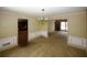 Spacious dining room with carpeting and window views at 2994 Ravenwolfe Way, Snellville, GA 30039