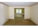 Bright and airy living room with view to dining area at 2994 Ravenwolfe Way, Snellville, GA 30039
