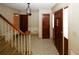 Inviting entryway with hardwood floors and staircase at 2994 Ravenwolfe Way, Snellville, GA 30039