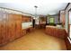 Open dining area adjacent to kitchen and wood cabinets at 2994 Ravenwolfe Way, Snellville, GA 30039