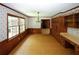 Bright dining area with wood wall paneling and chandelier at 2994 Ravenwolfe Way, Snellville, GA 30039
