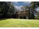 House back view with large backyard at 2994 Ravenwolfe Way, Snellville, GA 30039