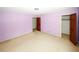 Spacious bedroom with neutral walls and ample closet space at 2994 Ravenwolfe Way, Snellville, GA 30039