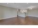 Open concept dining area with hardwood floors and kitchen with granite countertops at 300 Johnson Ferry Ne Rd # B902, Atlanta, GA 30328