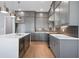 Modern kitchen with gray cabinets and ample counter space at 1936 Stanfield Nw Ave, Atlanta, GA 30318