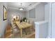 Formal dining room with wood table and hardwood floors at 10 Perimeter Summit Ne Blvd # 3412, Brookhaven, GA 30319