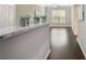 Granite countertop breakfast bar overlooks the living room at 10 Perimeter Summit Ne Blvd # 3412, Brookhaven, GA 30319