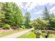 Landscaped walking path with a bridge and stone accents at 10 Perimeter Summit Ne Blvd # 3412, Brookhaven, GA 30319