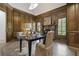 Bright home office features wood paneled walls, fireplace and hardwood floors at 850 Camden Park Ct, Atlanta, GA 30342