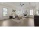 Large main bedroom with hardwood floors, fireplace, and ample natural light at 850 Camden Park Ct, Atlanta, GA 30342