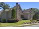 Brick front exterior of a charming two-story home with landscaping at 850 Camden Park Ct, Atlanta, GA 30342