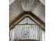 High-end wood ceiling detail with beams and metal railing at 850 Camden Park Ct, Atlanta, GA 30342