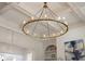 Stunning circular chandelier with glass shades illuminates the space at 850 Camden Park Ct, Atlanta, GA 30342