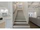 Elegant staircase with wood treads and metal railing at 850 Camden Park Ct, Atlanta, GA 30342