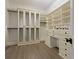 Large walk-in closet with ample shelving, drawers, and hanging space at 850 Camden Park Ct, Atlanta, GA 30342