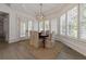 Bright breakfast nook with wooden table and built-in seating at 850 Camden Park Ct, Atlanta, GA 30342