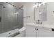 Modern bathroom with gray tile shower and white vanity at 850 Camden Park Ct, Atlanta, GA 30342