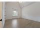 Spacious bedroom with hardwood floors and large window at 850 Camden Park Ct, Atlanta, GA 30342