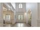 Two-story foyer with hardwood floors, elegant staircase and high ceilings at 850 Camden Park Ct, Atlanta, GA 30342