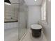 Modern bathroom with freestanding tub, herringbone tile, and glass shower at 850 Camden Park Ct, Atlanta, GA 30342