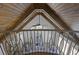 High-ceilinged living room with a cozy seating area and a stunning wood-paneled ceiling at 850 Camden Park Ct, Atlanta, GA 30342