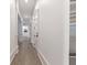 Bright hallway with hardwood floors and white walls at 850 Camden Park Ct, Atlanta, GA 30342