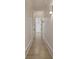 Light and bright hallway with hardwood floors and wainscoting at 850 Camden Park Ct, Atlanta, GA 30342