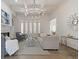 Bright and airy living room with hardwood floors and a statement chandelier at 850 Camden Park Ct, Atlanta, GA 30342
