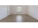 Bright bedroom with hardwood floors and window with shutters at 850 Camden Park Ct, Atlanta, GA 30342