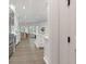 View down a hallway into a bright kitchen area at 850 Camden Park Ct, Atlanta, GA 30342