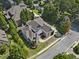 Luxury home with large yard and driveway, seen from above at 850 Camden Park Ct, Atlanta, GA 30342
