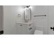 Modern bathroom with white tile and black fixtures at 850 Camden Park Ct, Atlanta, GA 30342