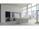 Modern community kitchen with island and city views at 3325 Piedmont Rd # 2203, Atlanta, GA 30305