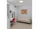 Small home office with built-in shelving and comfortable seating at 3325 Piedmont Rd # 2203, Atlanta, GA 30305