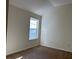 Bright bedroom with large window and vaulted ceiling at 635 Beddick Ln, Atlanta, GA 30349
