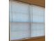 Bedroom with window and blinds at 635 Beddick Ln, Atlanta, GA 30349
