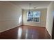 Bright dining room with hardwood floors and a chandelier at 635 Beddick Ln, Atlanta, GA 30349