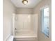 Clean bathroom with a shower/tub combo at 1054 Valley Rock Dr, Lithonia, GA 30058